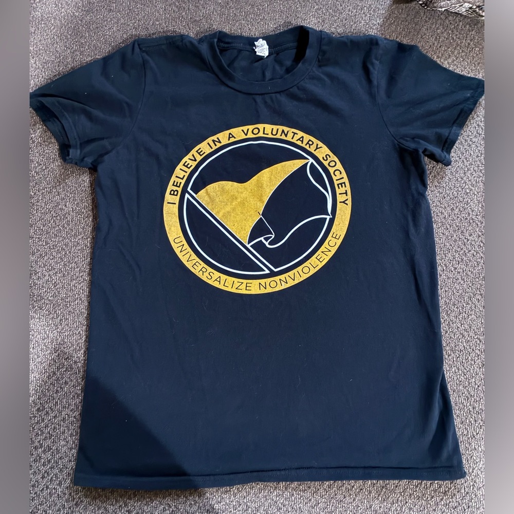 Anvil S Black t-shirt with a voluntaryist flag logo & "Universalize Nonviolence"